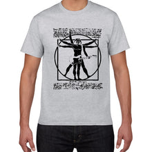 Cargar imagen en el visor de la galería, Funny Da Vinci guitar/drum T-Shirt Vitruvian Man rock band Vintage